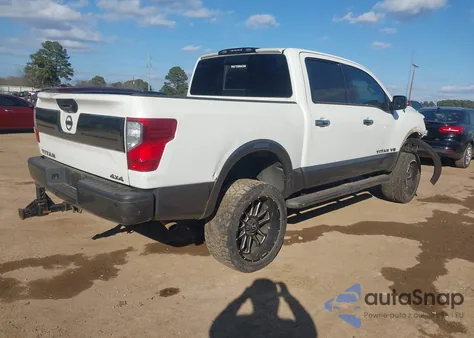 2019 Nissan Titan Platinum Reserve z USA, uszkodzony, nr VIN 1N6AA1E54KN528963